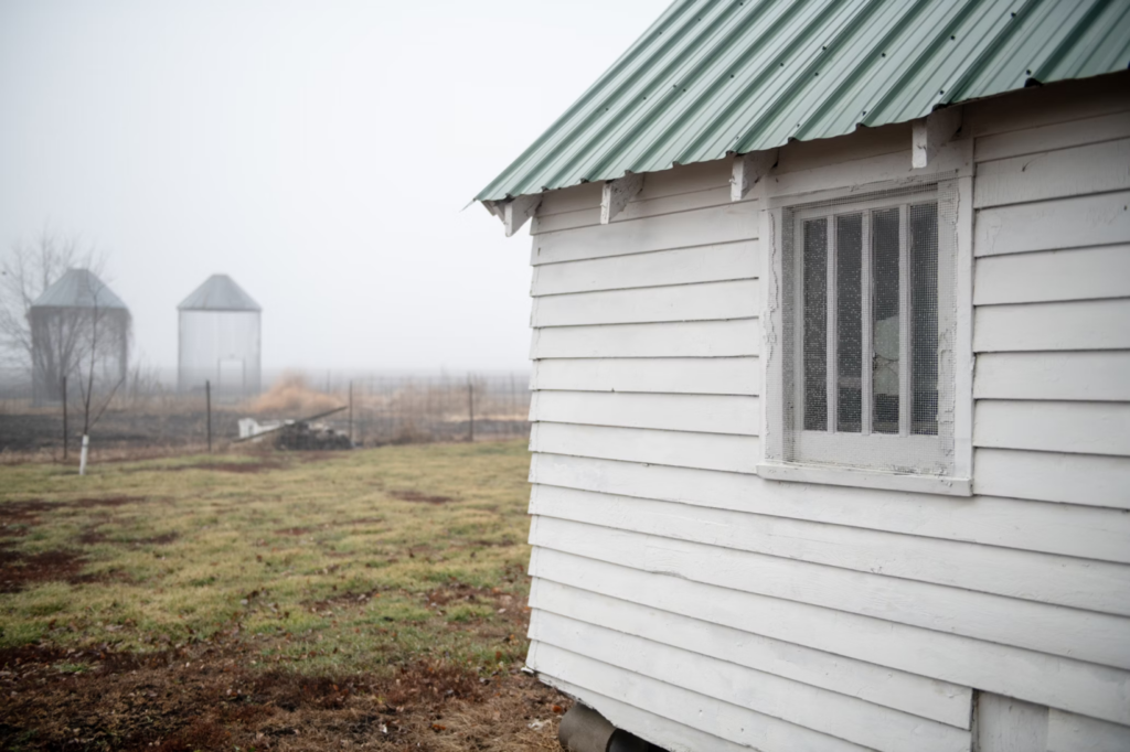 A small house with a metal roof in Minnesota.