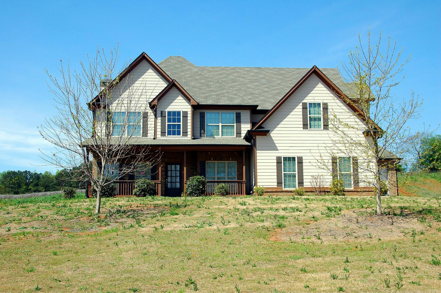 A house with a gray roof.
