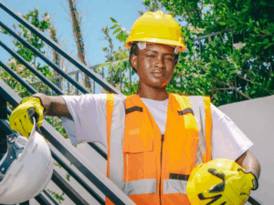  A woman holding a hard hat