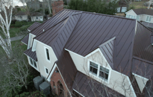 A large house with brand new roofing installations.