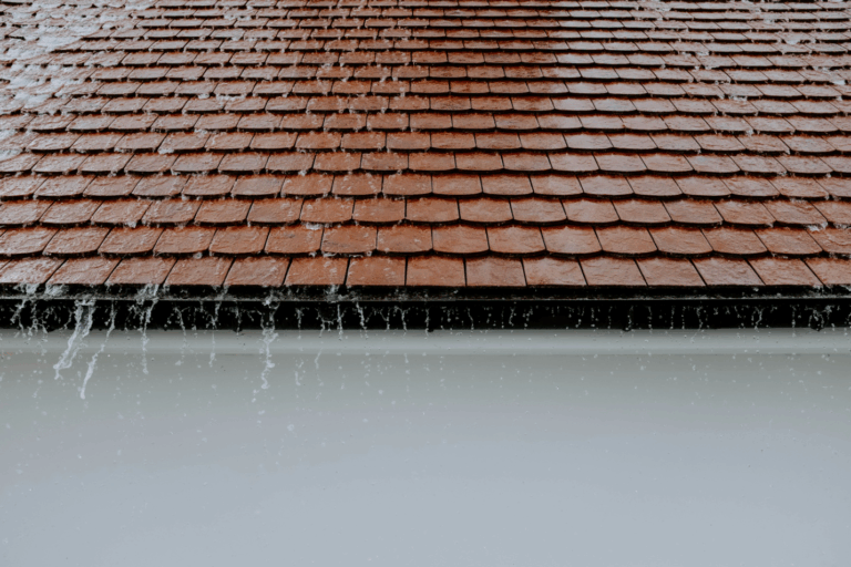 water running down from a shingle roof