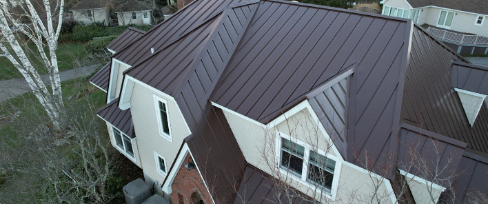 A large house with metal roofing fixtures.