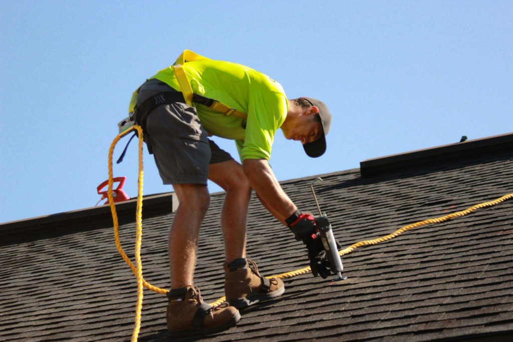 a roofer working on repairs