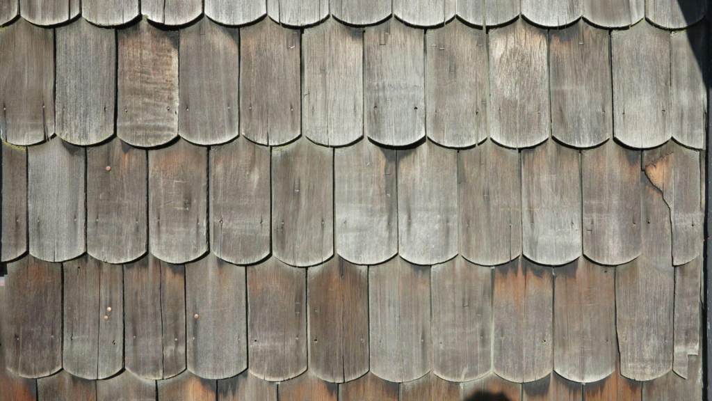 top view of old and damaged shingle roofing
